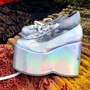 Barely worn! A few makeup stains. Want to regift to someone who can use!